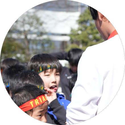 笑顔のコーチ